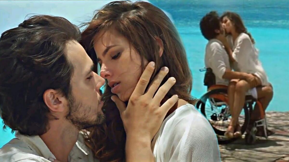 Bruno Ferrari (Artur) e Thaís Melchior (Diana) dando um beijo em cena de Vitória