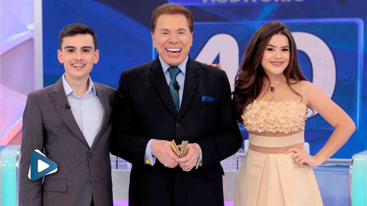 Dudu Camargo abraçado com Silvio Santos e Maisa Silva