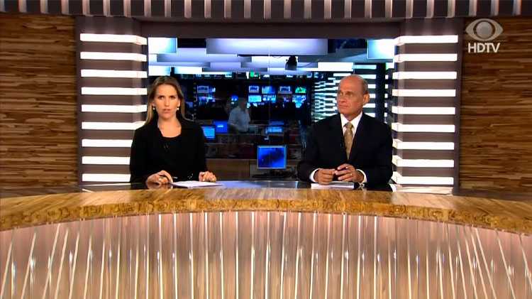 Mariana Ferrão e Ricardo Boechat apresentando o 'Jornal da Band'