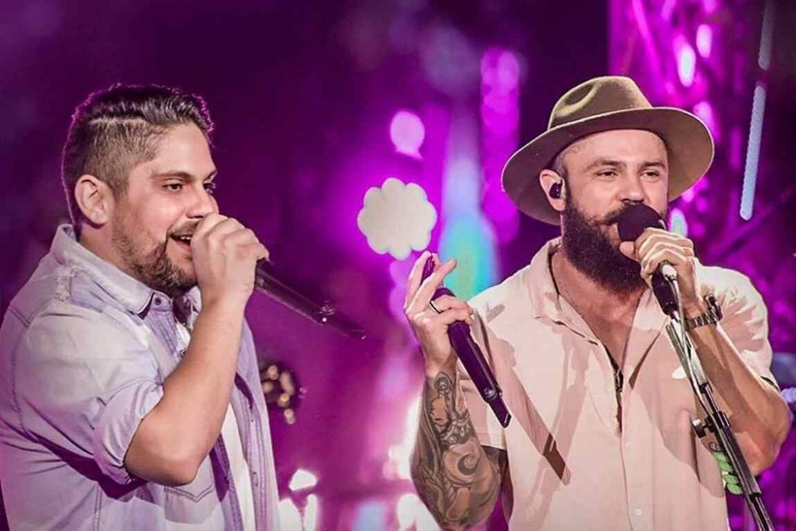 Dupla Jorge & Mateus em um pôster de divulgação