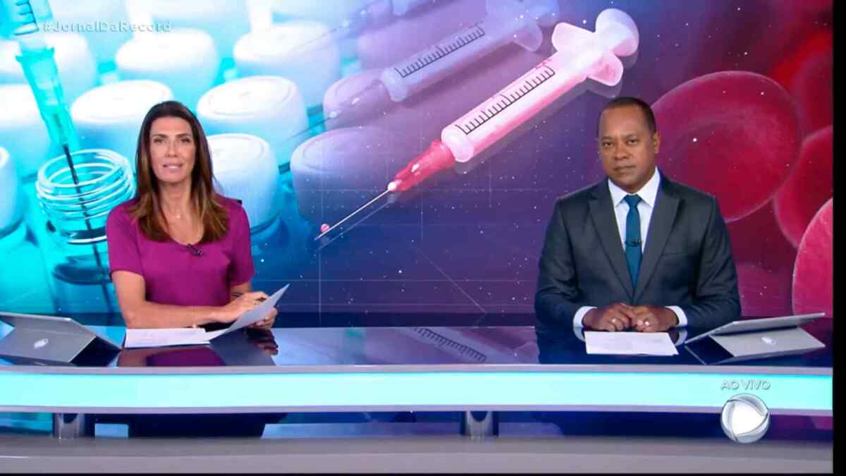 Janine Borba e Luiz Fara Monteiro apresentando o Jornal da Record desta terça-feira (29)