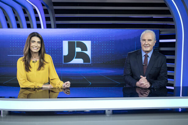 Janine Borba e Celso Freitas na bancada do Jornal da Record