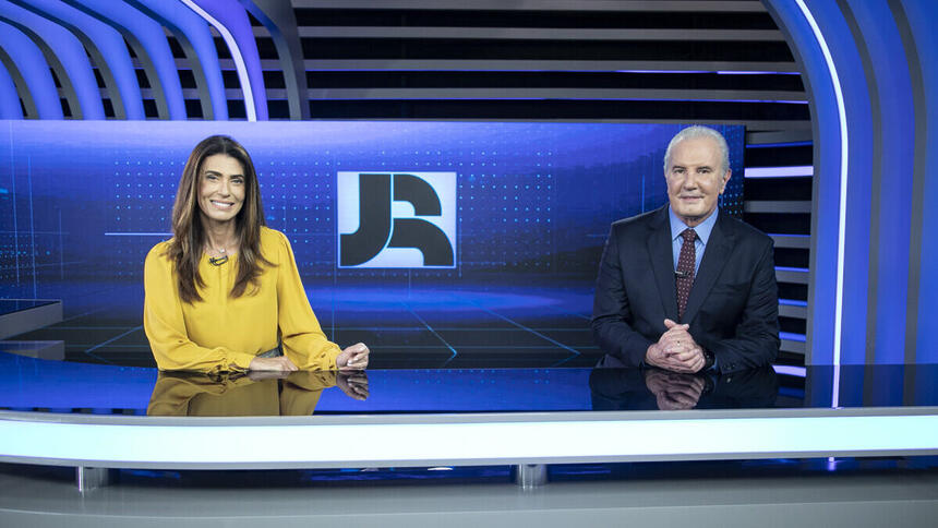 Janine Borba e Celso Freitas na bancada do Jornal da Record