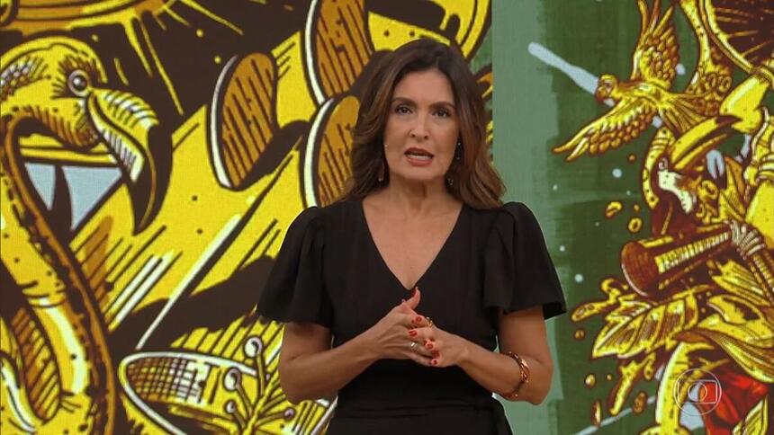 Fátima Bernardes utilizando um vestido preto no estúdio do Encontro