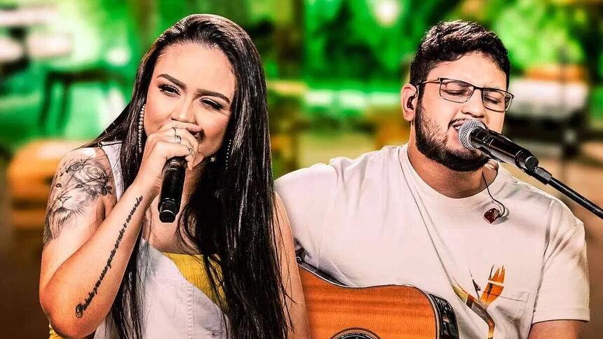 Dupla Luiza e Maurílio durante gravação de clip musical