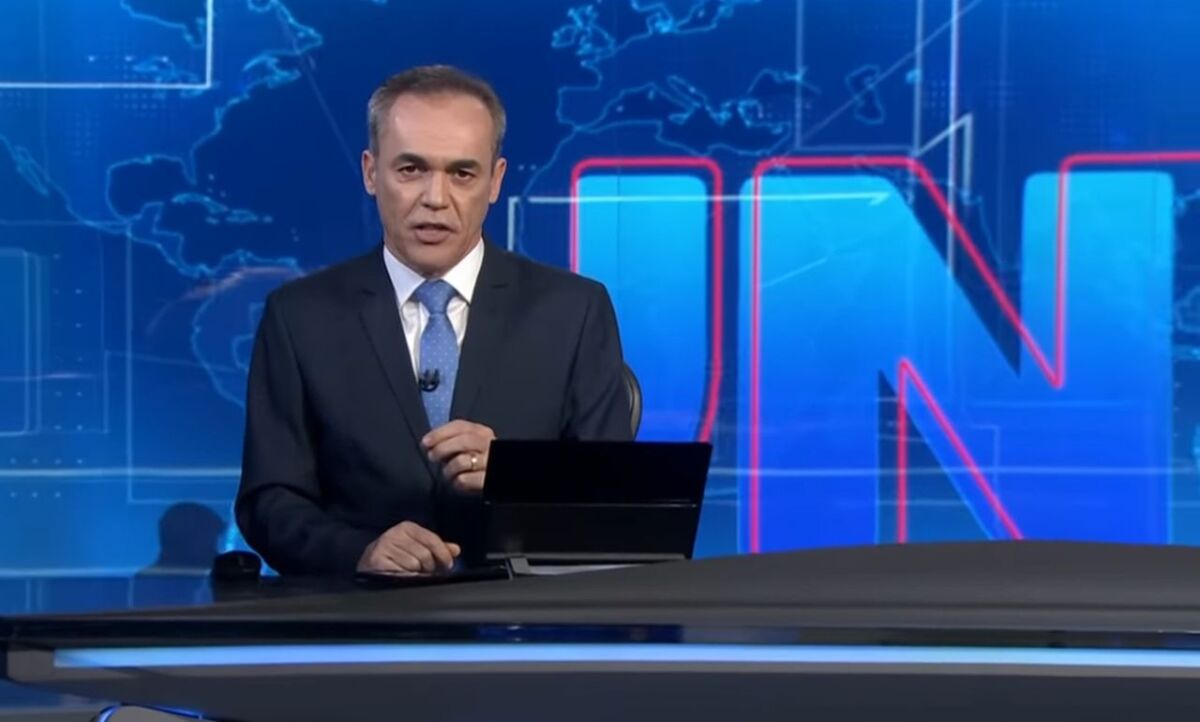 Sandro Dalpícolo na bancada do Jornal Nacional