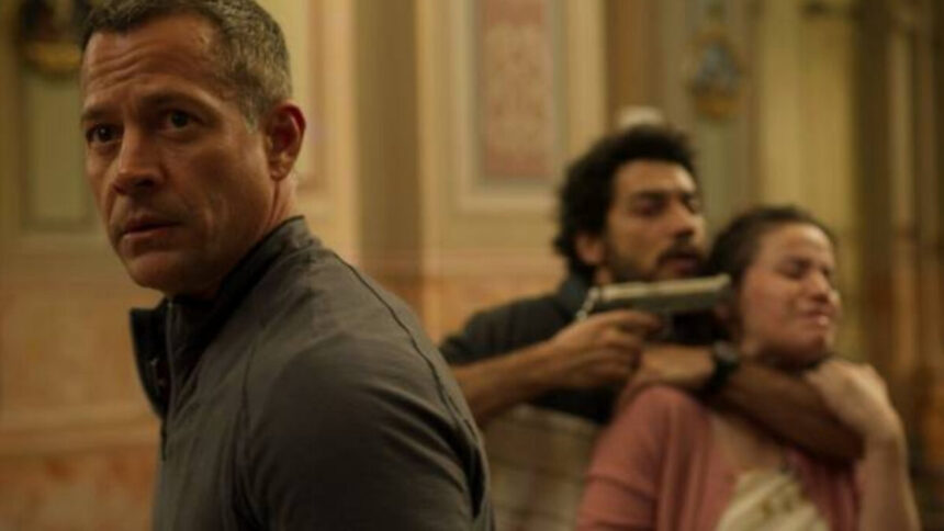 Malvino Salvador em cena de O Negociador