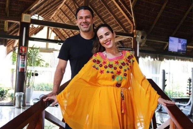 Marcus Buaiz e Wanessa Camargo em foto posada em uma tenda de madeira