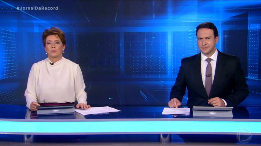 Christina Lemos e Eduardo Ribeiro na bancada do Jornal da Record