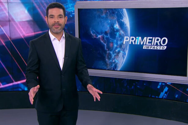 Darlisson Dutra nos estúdios do Primeiro Impacto, em frente ao televisor