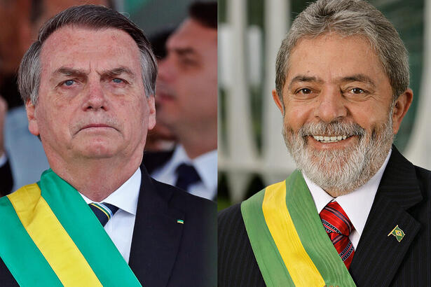 Bolsonaro com sempblante sério, blazer preto e gravata listrada preta e branco; Lula sorrindo de gravata vermelha - ambos com a faixa de presidente