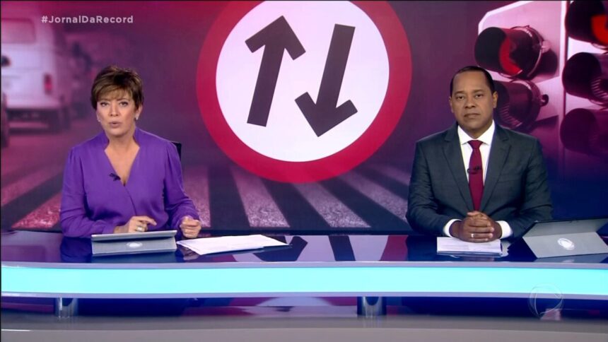 Christina Lemos e Luiz Fara Monteiro na bancada do Jornal Da Record