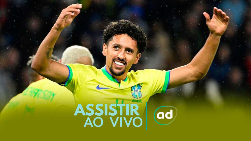 Zagueiro Marquinhos com os braços abertos em jogo do Brasil contra Gana - arte de onde assistir jogo de futebol