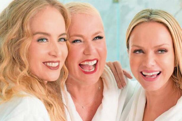 Angélica, Xuxa e Eliana sorrindo durante gravação de propaganda