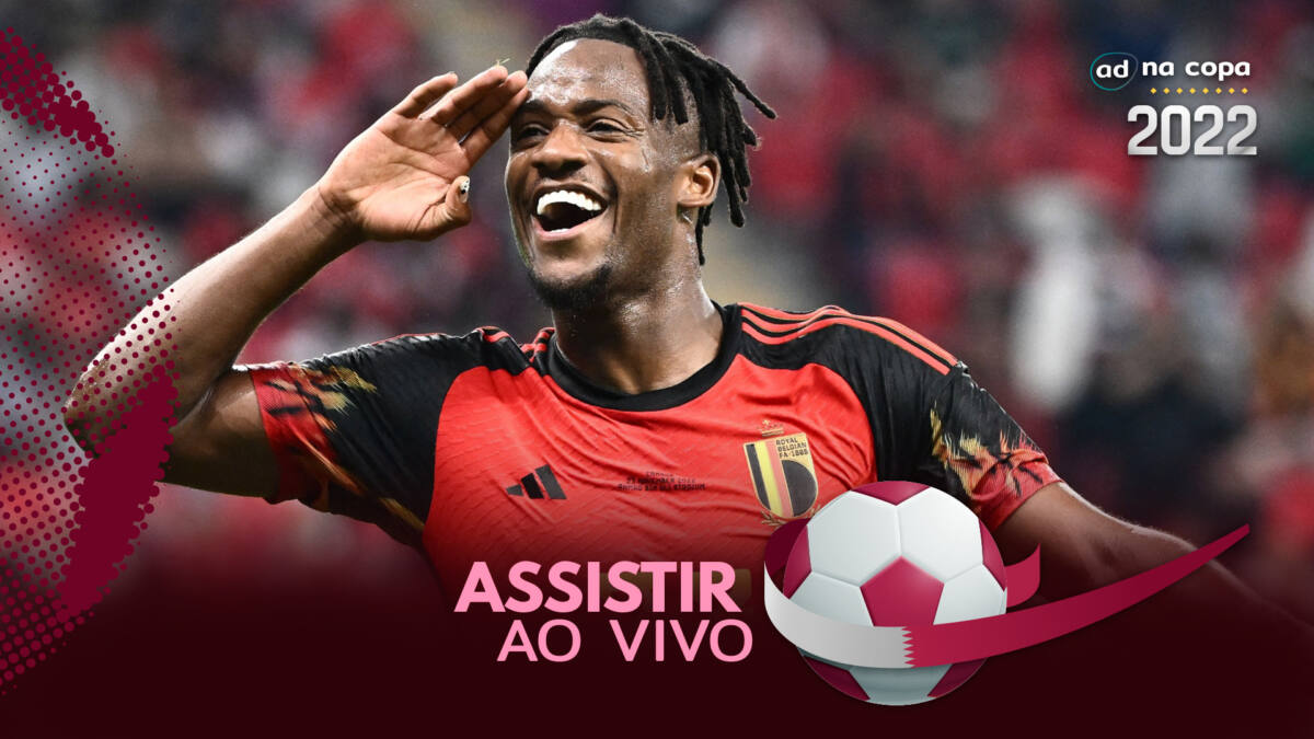 Jogador Michy Batshuayi, com a camisa da Bélgica, na arte onde assistir ao jogo Bélgica x Marrocos