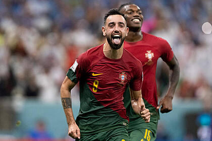 Bruno Fernandes comemorando gol por Portugal contra o Uruguai na Copa do Mundo