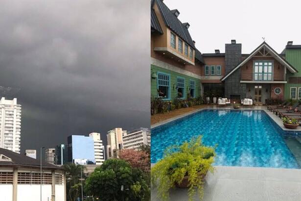 Na imagem aparece o céu carregado de chuva na cidade de São Paulo. Do outro lado da imagem a sede de A Fazenda 14.