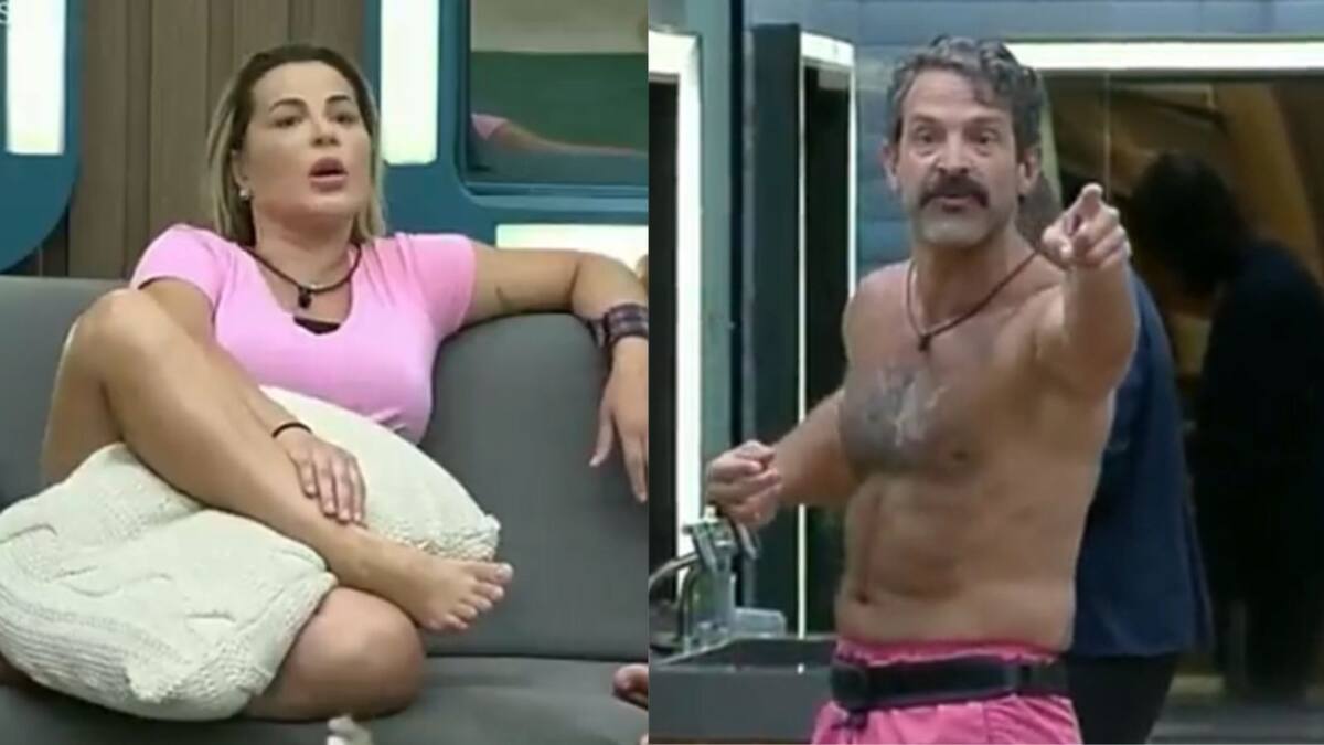 Deolane sentada no sofá olhando em direção a Iran que está apontado para a advogada.