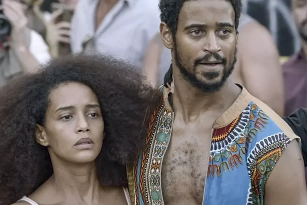 Taís Araújo e Alfred Enoch em trecho do filme Medida Provisória