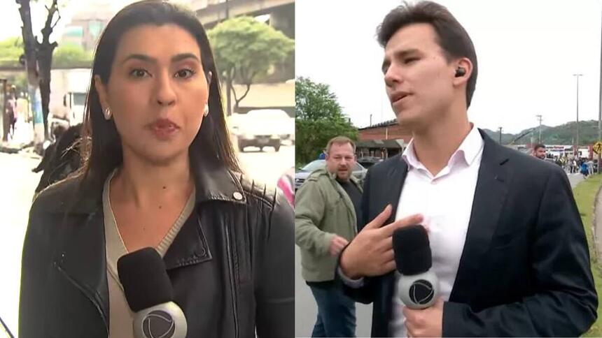 Repórteres Paola Vianna e Stevão Limana com a canopla da Record TV durante a cobertura dos protestos