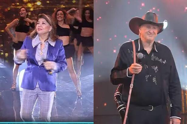 Roberta Miranda vestida com roupa azul, segurando o microfone no palco do Faustão Na Band. Sérgio Reais vestido de roupa preta e segurando um berrante.