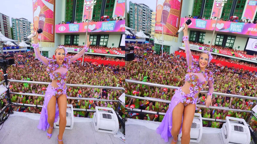 Claudia Leitte levanta os braços em cima do trio e mostra o público em seu último dia de carnaval em Salvador