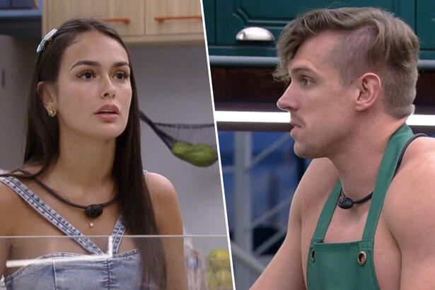 Larissa olha para Cristian enquanto discutem na cozinha do BBB 23