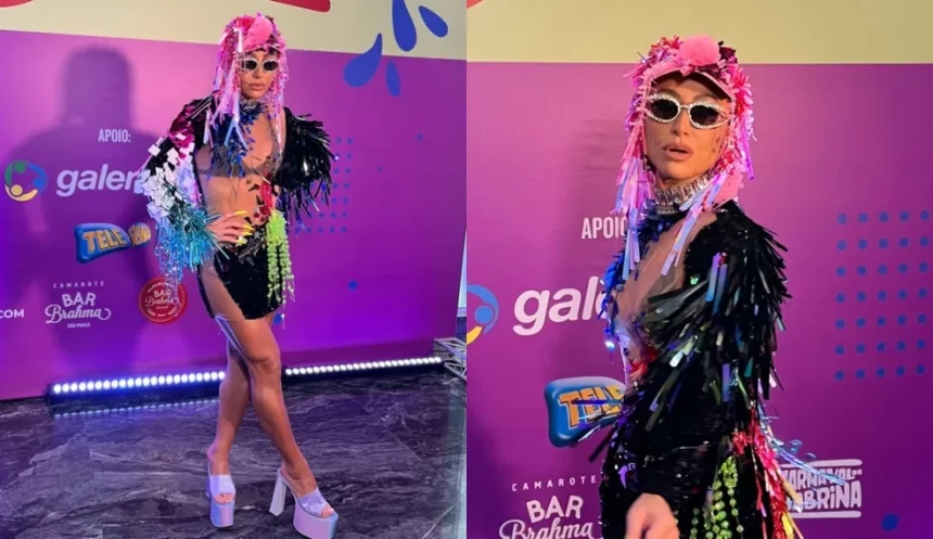 Sabrina Sato de vestido preto com adereços coloridos para desfile no bloco Unidos da Brahma