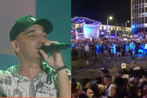 João Gomes canta no palco do Marco Zero enquanto pessoas brigam em cenas de pancadaria do Carnaval de 2023 no Recife