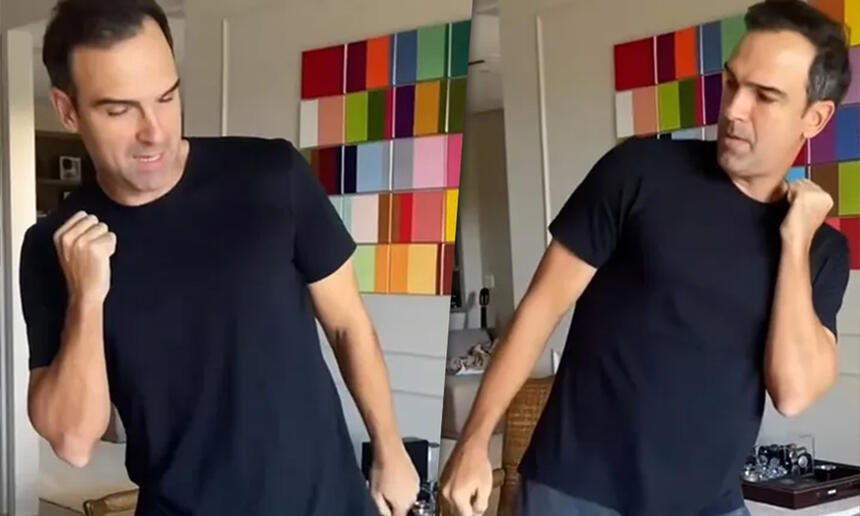 Tadeu Schmidt de camisa preta dançando durante gravação de vídeo