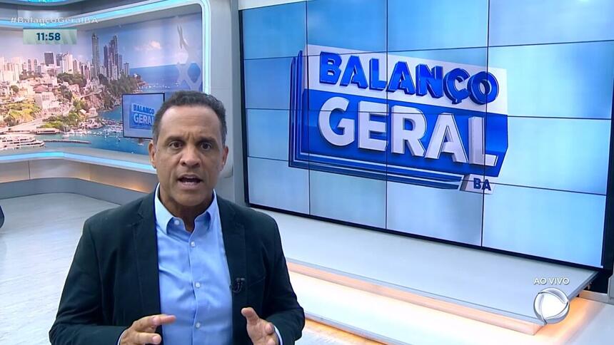 José Eduardo Bocão com semblante indignado apresentando no cenário do Balanço Geral BA, apresentando o programa.