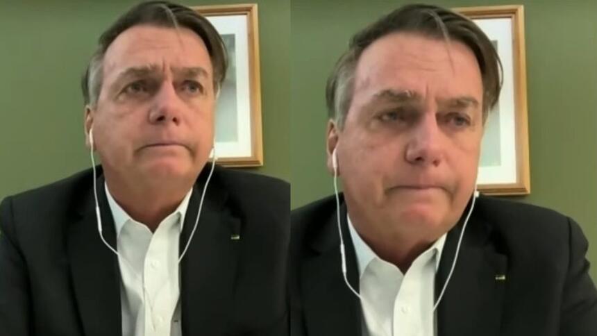 Bolsonaro de terno e camisa branca chorando ao vivo, em entrevista a Jovem Pan