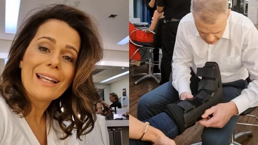 Adriana Araújo e Eduardo Oinegue ajeitando a bota do pé da apresentadora que torceu o pé