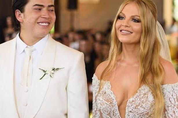 Whindersson Nunes olhando e sorrindo para Luisa Sonza durante casamento