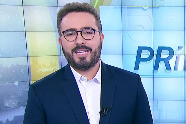 Felipe Malta apresentando o Primeiro Impacto