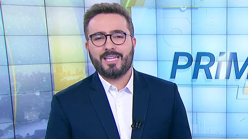 Felipe Malta apresentando o Primeiro Impacto