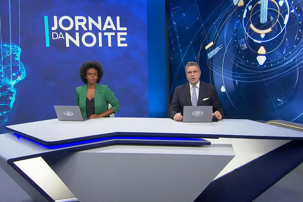 Cynthia Martins e Felipe Vieira na bancada do Jonal da Noite