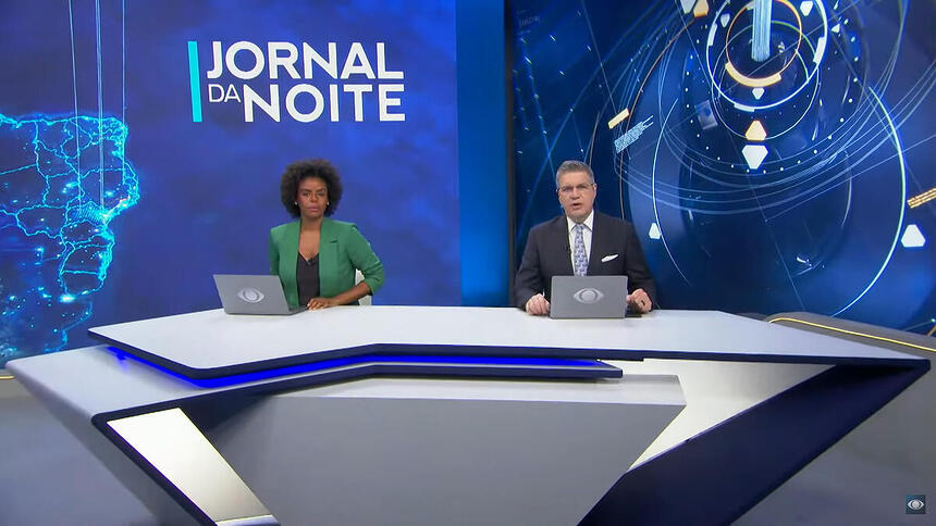 Cynthia Martins e Felipe Vieira na bancada do Jonal da Noite