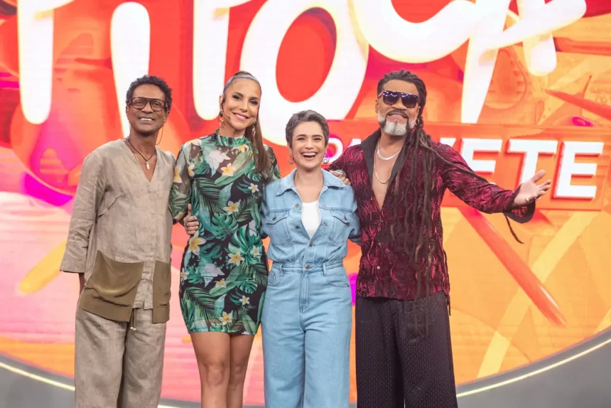 Ivete Sangalo sorrindo ao lado de Sandra Annenberg ao lado de Carlinhos Brow