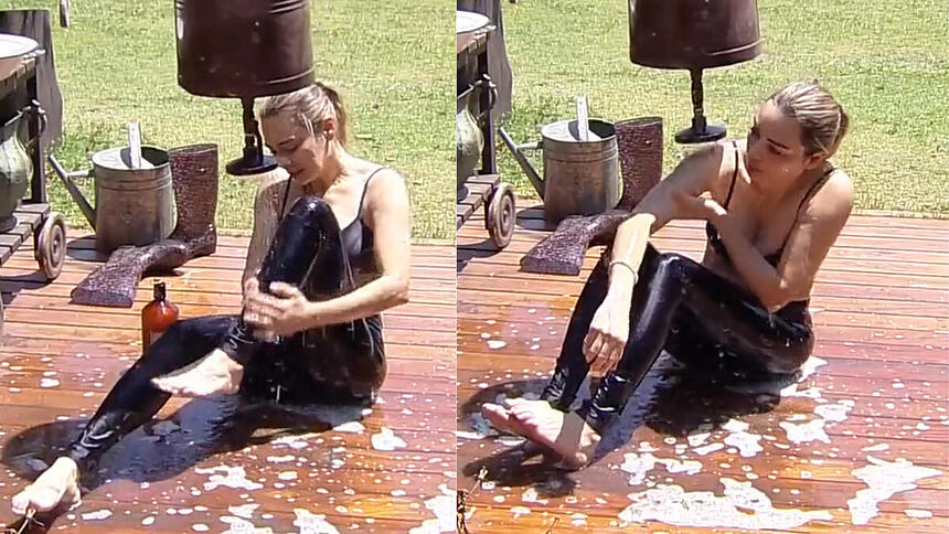 Rachel Sheherazade tomando banho com um regador em A Fazenda 15