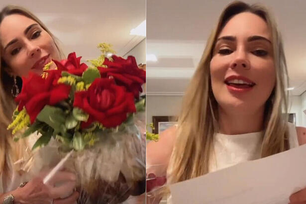 Rachel lendo carta da Cariúcha com um buque de flores