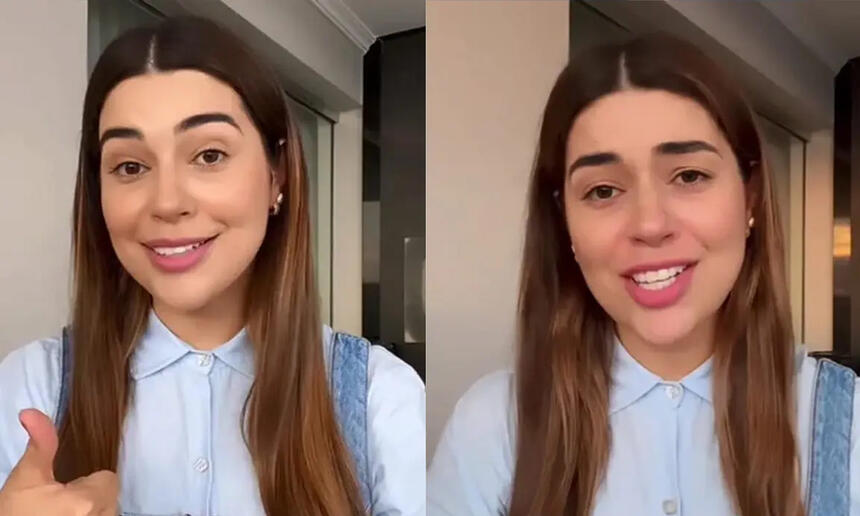 Vivian Amorim de camisa azul bebê, cabelo liso, solto, gravando stories para o Instagram