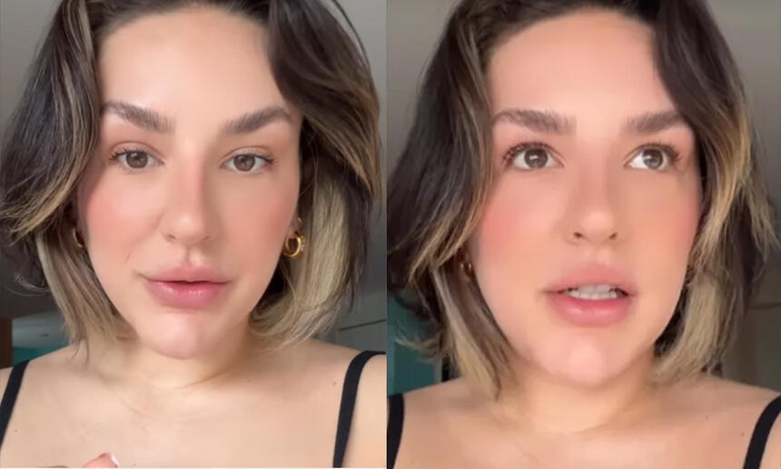 Kéfera de cabelo liso, solto, curto, de camisa regata preta, gravando vídeo para as redes sociais