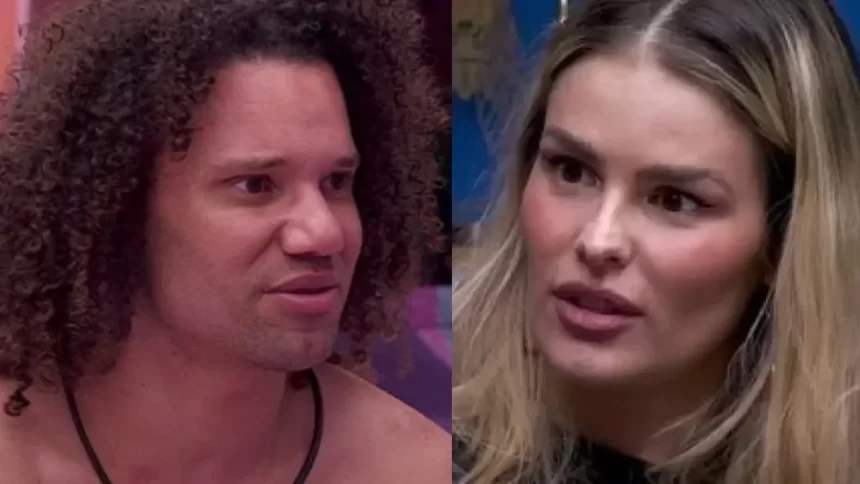 Yasmin Brunet assustada, olhando para Maycon, sentada na sala do BBB 24