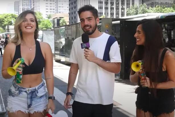 João Guilherme e suas assistentes na Avenida Paulista