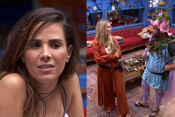 Wanessa Camargo de cabelo solto, liso, com cara de poucas amizades, sentada no sofá da sala do BBB 24; Yasmin Brunet ao lado de Michel, em pé, em frente ao telão