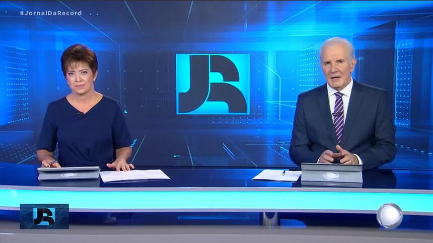 Christina Lemos e Celso Freitas na bancada do Jornal da Record