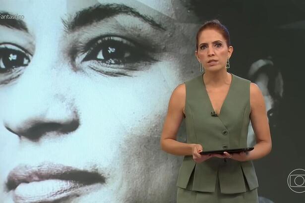 Poliana Abritta à frente do telão do Fantástico com imagem de Marielle ao fundo