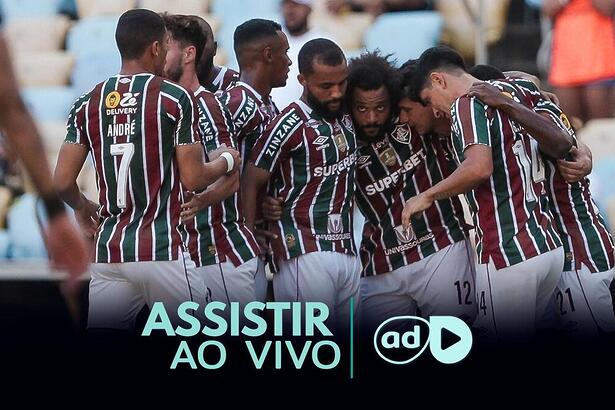 Jogadores reunidos e abraçados na arte onde assistir ao jogo Cerro Porteño x Fluminense pela Libertadores