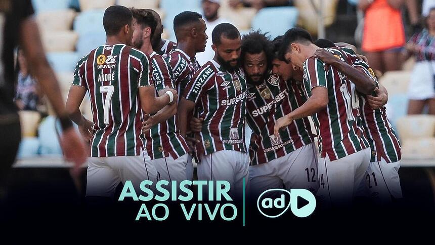 Jogadores reunidos e abraçados na arte onde assistir ao jogo Cerro Porteño x Fluminense pela Libertadores